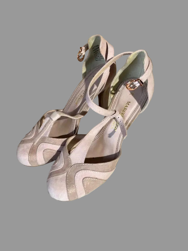 A pair of women's high-heeled sandals in a light blush pink and taupe colorway, featuring a strappy design and a small rose gold buckle on the side. The brand name 'MALESTRO' is visible on the insole.