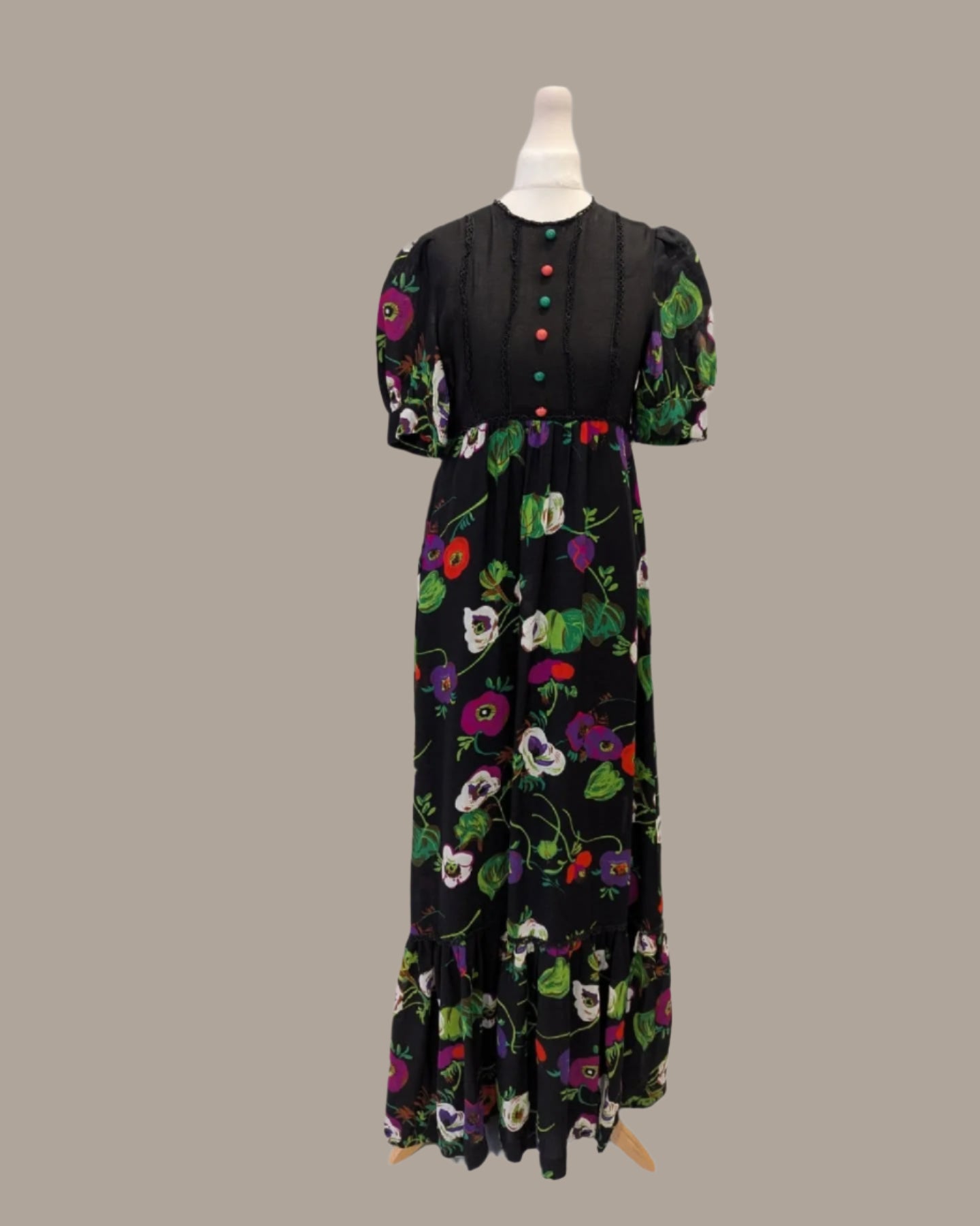 black floral print dress on mannquin